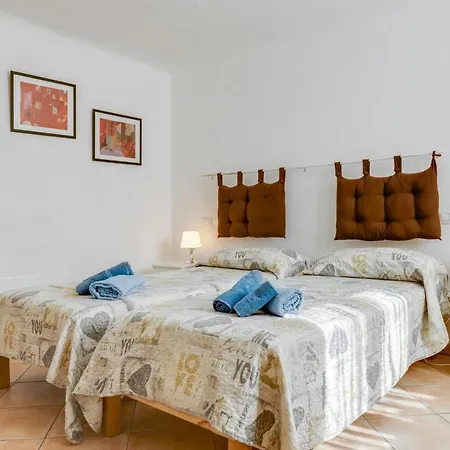 Guesthost - Migliarina Bedrooms *